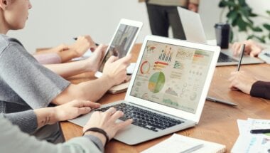A group of colleagues making the move from intuition-led to data-driven decision-making.